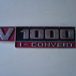 ANAGRAMA METÁLICO CONVERT V-1000